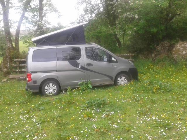 Campervan in field